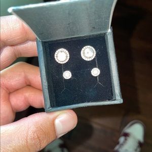 Smaller earrings are .5 Carat Diamond Studs and Bigger ones bought from zales